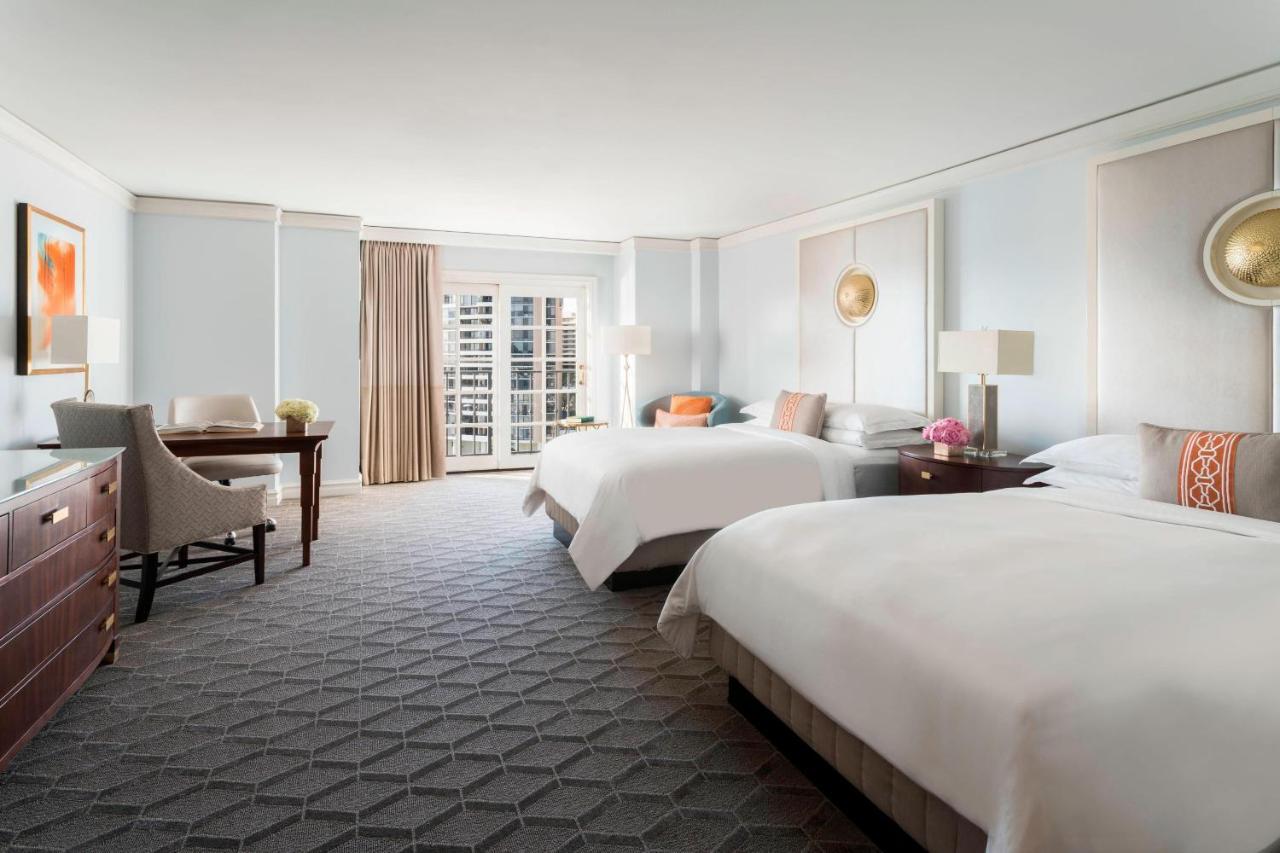 Grande chambre avec 2 Lits Doubles - Vue Partielle sur Eau